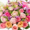 close up of pink, peach and purple bouquet