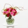 Mixed red & pink bouquet in a vase
