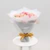 Pink mixed flower bouquet with paper
