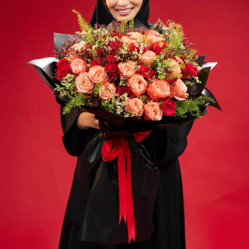 Elegant Blend: Orange & Red Roses with White and Purple Limonium