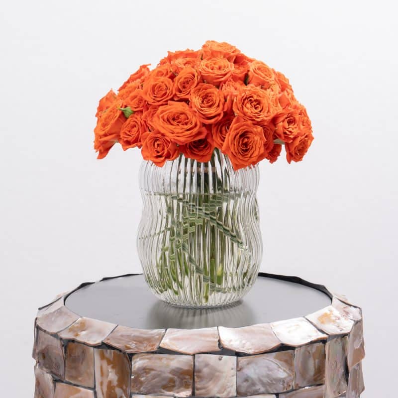 Orange Spray Roses in Glass Vase