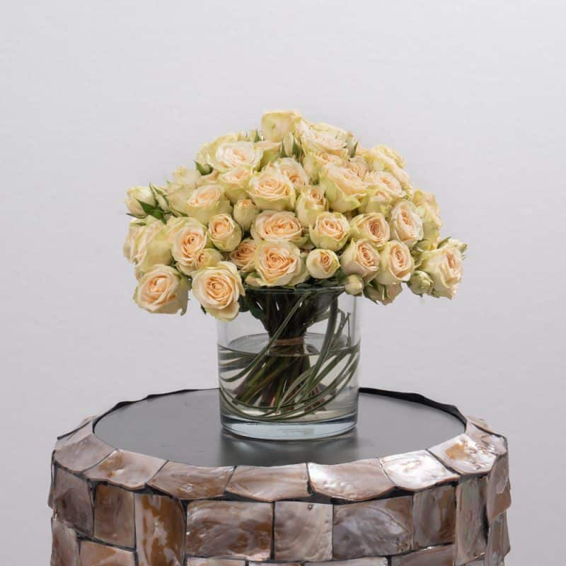 Peach Spray Roses in Stylish Glass Vase (13 CM)