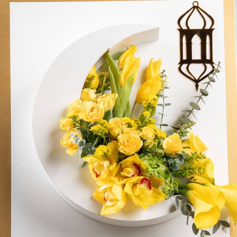 Radiant Moonlight: Yellow Cymbidium & Callas in Wooden Moon