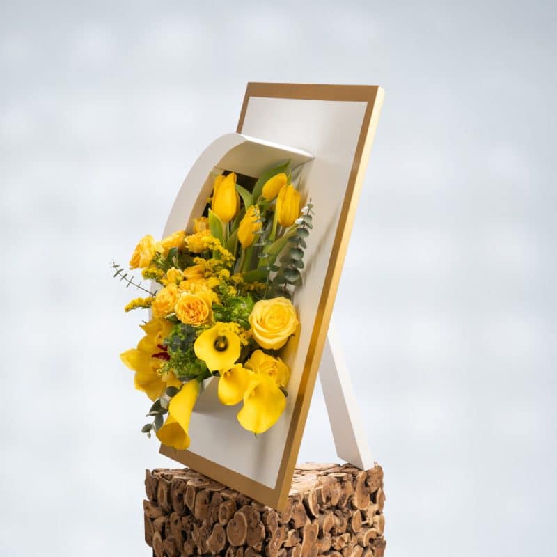 Radiant Moonlight: Yellow Cymbidium & Callas in Wooden Moon