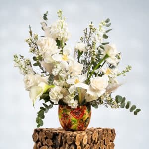 White Roses, white Tulips, Pampas Grass, Eucalyptus, white Carnation,white Mathiola.